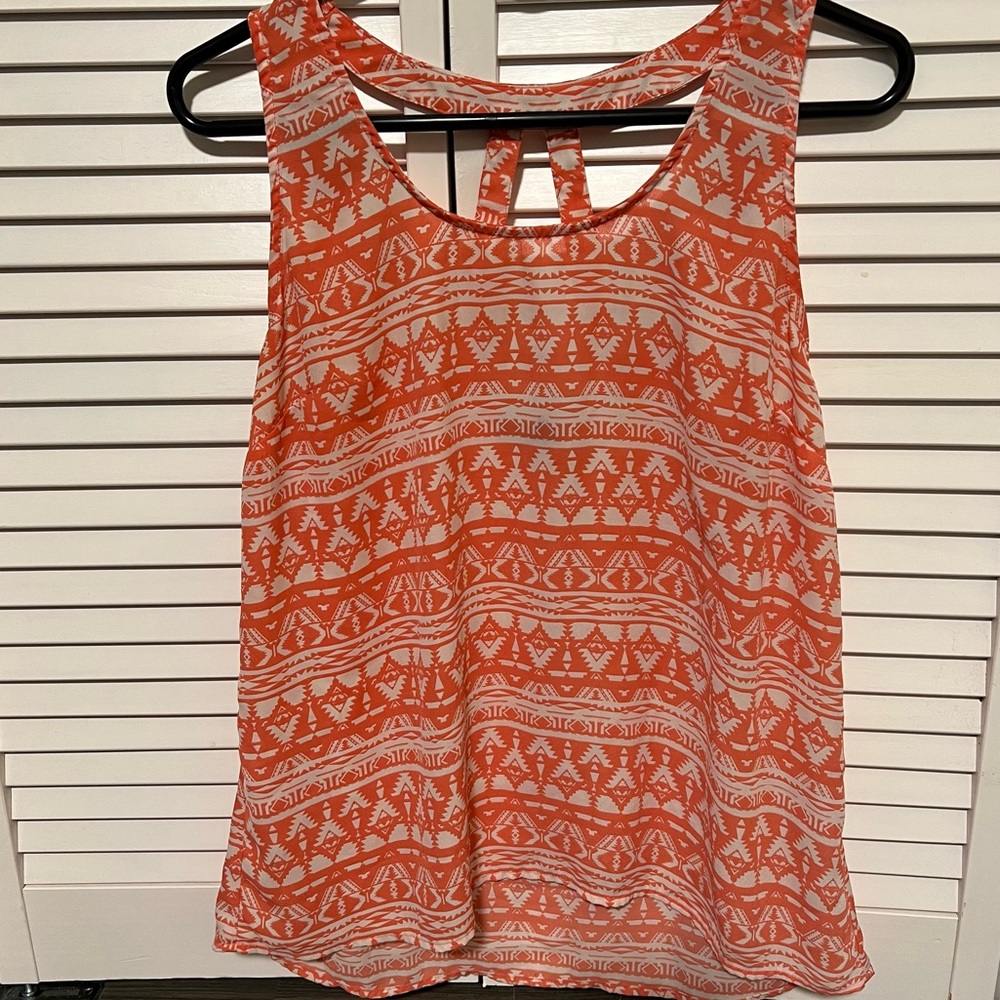 Bright salmon and white color tank top. Great bathing suit cover up.